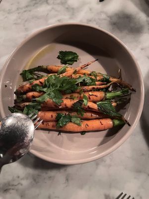 grilled carrots zhug, herb salad at Decade in Louisville