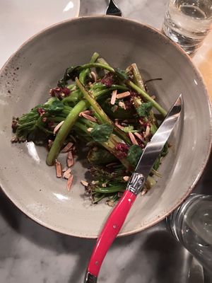 caulini, minted green chickpea, almond, calabrian chili, nasturtium at Decade in Louisville