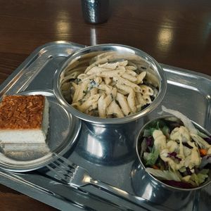 Penne with salad and almond cake for dessert at Govinda in Eger