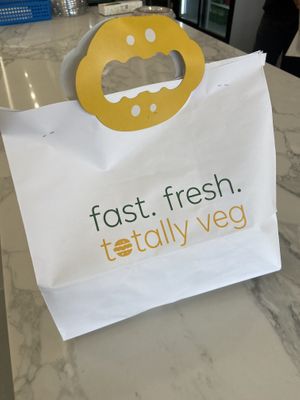 Cute food bag  at Vegholic Shawarma & Burger in Brampton