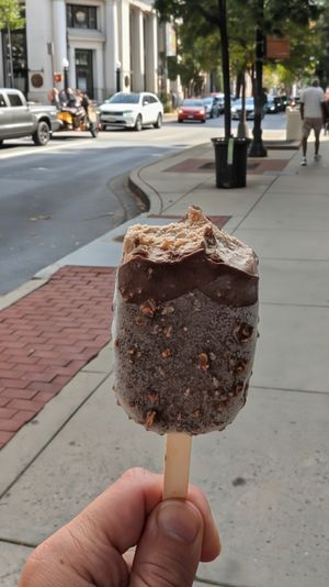Oat Milk Chocolate Ice Cream dipped in Dark Chocolate and Puffed Rice at Rare Morsel in Frederick
