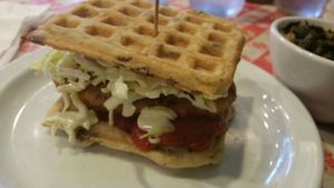 Chicken 'n waffle sandwich with jalapeño slaw and homemade BBQ. Amaaaaaazing at Soul Groove in San Francisco
