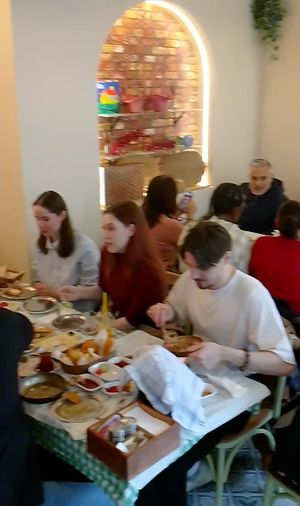 Happy people at Cihangir Sanat Cafe in Istanbul
