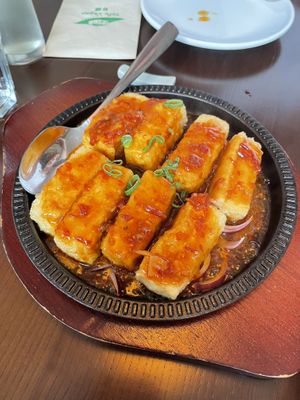 Sizzling tofu in house special sauce   at Tofu Vegan in Brighton