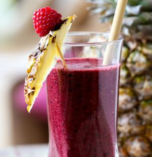 Super-smoothie with pineapple, fresh blueberries and raspberries , acai berry , green coconut water at Soma Vital Food in Sofia