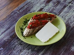 Homemade lyutenitza(traditional bulgarian starter) with naturally fermented probiotic cashew cheese and homemade sourdough bread. at Soma Vital Food in Sofia