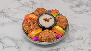 Crispy Syrian falafel made from chickpeas and herbs, served fresh. A popular vegan Middle Eastern street food favourite. at Damastique in York