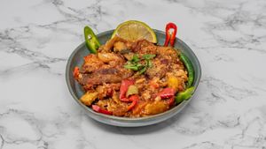 Traditional Syrian musakaa made with aubergine, chickpeas and tomato sauce. A hearty vegan Middle Eastern classic. at Damastique in York