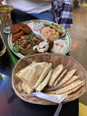 Dips, falafel and pita bread (part of The Persepolis Full Feast)  at Persepolis - Snackistan in South East London