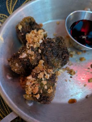 Chive cakes (half eaten) at Esan Thai SE Division in Portland