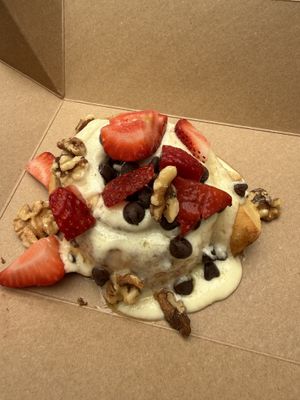 Basic roll with strawberries, chocolate chips and walnuts   at Cinnaholic - Berkeley in Berkeley