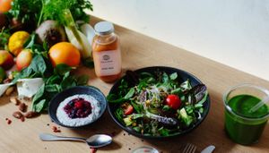 DALUMA's coldpressed juice Pink Fuel, Chia Pudding with Acai-red berry topping and the big green salad with macadamia lime dressing. at Daluma in Berlin