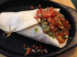 Scrambled tofu open tortilla w/ crispy potato, crushed avocado, mixed greens & fresh salsa at Saluna in Newcastle