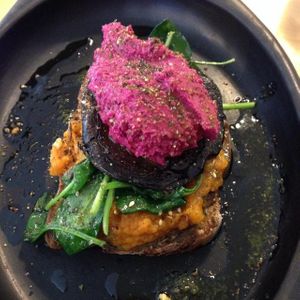 Bruschetta on sourdough w/ maple roast squash, roasted field mushroom, sesame wilted spinach, beetroot hommus & a dust of zataar   at Saluna in Newcastle