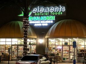 The outside of the store at night at Elements Natural Foods - Grab n Go Market in West Covina
