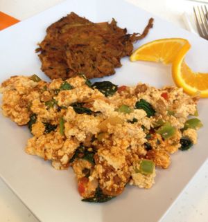Soyrizo tofu scramble, made extra spicy, added spinach & onions. That's the sweet potato hash on the side. at Scramble in Scottsdale