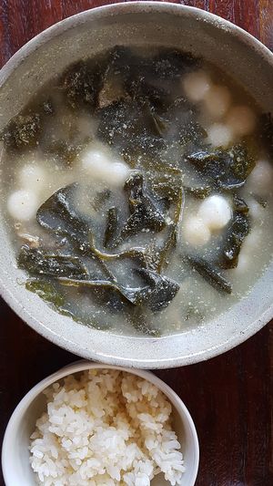 Ongsimi miyeok guk 옹심이 미역국 - Korean seaweed soup with rice cakes in a broth with ground perilla seeds
 at Maji - 마지 in Seoul