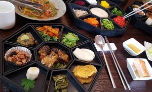 "Maji Gujeolpan course" (마지 구절판 코스):
Side dishes; sweet and sour shiitake; pancakes; deodeok root; tofu steak; grilled mushroom; glass noodles at Maji - 마지 in Seoul
