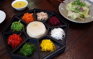 "Maji Gujeolpan course" (마지 구절판 코스):
Thin wheat pancakes with sliced vegetables; salad; porridge at Maji - 마지 in Seoul