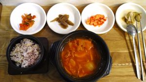 Army stew set (budae jjigae), labelled as Kimchi soup with sausage. This is not found on the sheet of menu with pictures. I saw this on the wall and ordered it. It was really delicious. Too bad the soup was only half of the stone bowl. at Babione - 바비오네 in Seoul