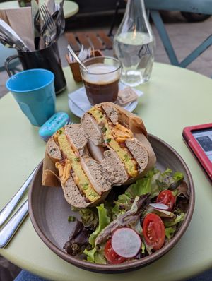 Egg and cheese bagel as vegan option at Cafe Xoho in Tel Aviv