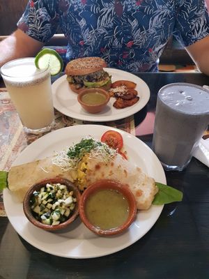 Vegan wrap with "egg" and burger for breakfast at Samsara in Antigua