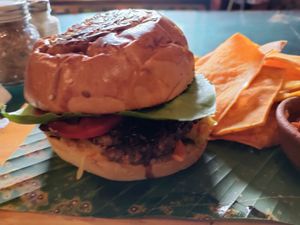 Tempeh kraut burger with sweet potato chips at Samsara in Antigua