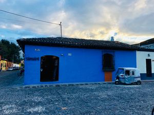 Samsara outside with tuk-tuk parked in front at Samsara in Antigua
