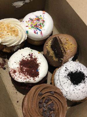 Assorted cupcakes. Their special flavours are usually better than the permanent. SO much icing.   at Bunner's Bake Shop - Kensington in Toronto