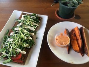 not my favorite but still good, pizza and sweet potato fries at Trilogy Sanctuary in La Jolla
