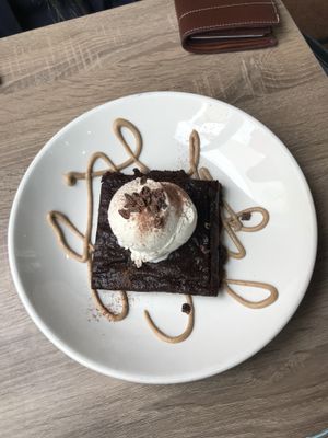 Transcendent hot brownie with coconut ice cream at Trilogy Sanctuary in La Jolla