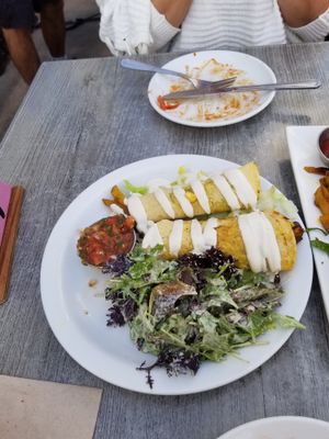 Rolled Cali tacos with lemon tahini side salad at Trilogy Sanctuary in La Jolla
