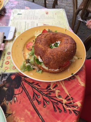 Avocado on tomato bagel  at Bagels & Beans - Plaats in The Hague