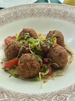 Chickpea Fritters over baba ghanoush - DELICIOUS!  at Swifty's at the Colony Palm Beach in Palm Beach