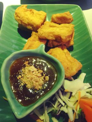 Tofu with house made plum sauce with her crushed cashews  at Jintana Thai in Bowness-on-windermere