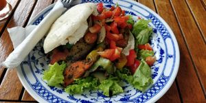 Cream cheese bagel with excellent roasted veggies at Epic Arts Cafe in Kampot