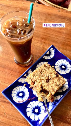 Khmer iced coffee and vegan flapjack.  at Epic Arts Cafe in Kampot