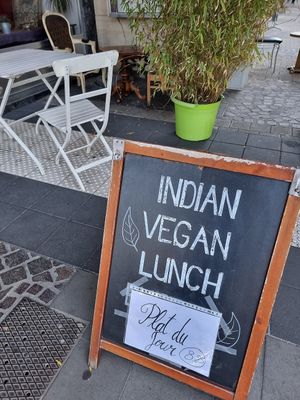 outdoor sign on pavement at Nirvana Cafe in Luxembourg City