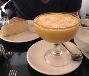 Lemon cake and huge amount of mango pudding!! at Nirvana Cafe in Luxembourg City