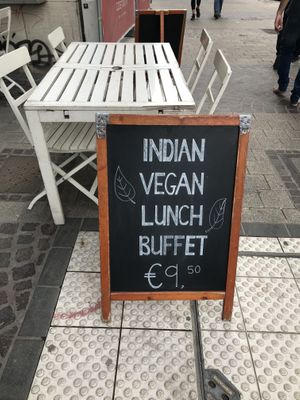 Outside sign on street corner  at Nirvana Cafe in Luxembourg City