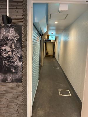 Down the hall on the left at Vege Kitchen KelaKela in Osaka