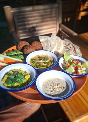 Mezze plate, homemade hummus, tomato tartre, falafel ( raw or not) 
Guacamole cashew sesame cream raw vegetables at Soul Garden in Koh Phangan