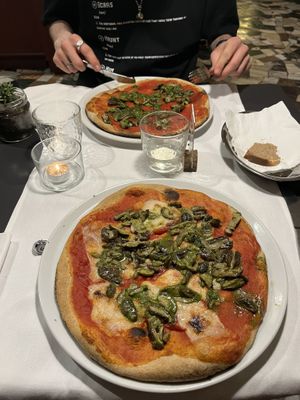 Pizza with mushrooms, lentil mozzarella and vegan pesto   at La Colubrina in Milan