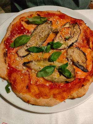 Pizza parmigiana at La Colubrina in Milan