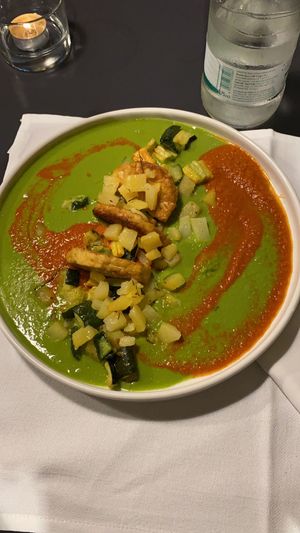 Mezzelune di tempeh rosolato con funghi shiitake saltati e ragù di pomodorini confit e piselli  at La Colubrina in Milan