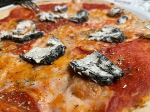 Creamy, vegan “bluebert” (blue Camembert) really complements the pizza!  at La Colubrina in Milan