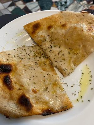 Focaccia con mozzarella di lenticchie at La Colubrina in Milan