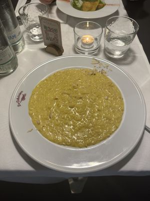 risotto con zafferano mantecato con crema di mandorle  at La Colubrina in Milan