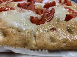 Focaccia integrale di farro con pomodorini  at La Colubrina in Milan