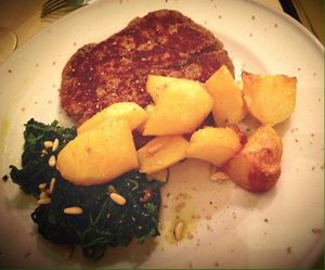 vegan cotoletta with herbs and roasted potatoes at La Colubrina in Milan